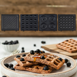 Electrova 4-in-1 waffle maker with interchangeable waffle, donut, sandwich and cake pop baking plates