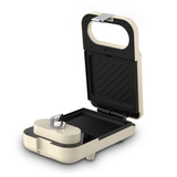 Electrova Classic 50's Series waffle maker opened to display interchangeable non-stick cooking plates